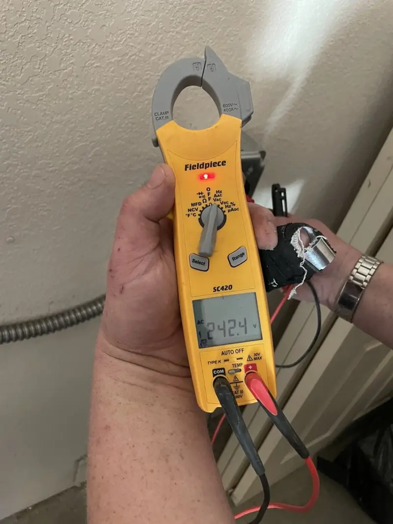 Voltage testing with clamp meter during Generator Installation in Sullivan